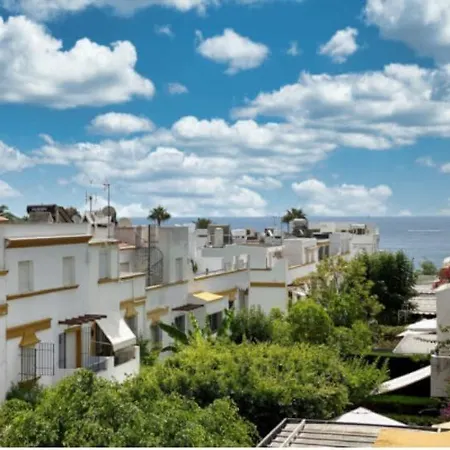 A Bright Townhouse In The Marbellamar Residential Development Marbella